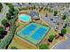 Aerial view of community tennis courts and pool at 1369 Star Water Dr, Lawrenceville, GA 30045