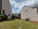 Wide fenced-in backyard with grass at 1369 Star Water Dr, Lawrenceville, GA 30045