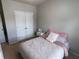 Comfortable bedroom with soft carpet, large closet and a cozy bed at 1369 Star Water Dr, Lawrenceville, GA 30045