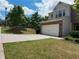 Charming home featuring a two-car garage and well-maintained lawn at 1369 Star Water Dr, Lawrenceville, GA 30045