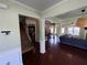 Open-concept floor plan with hardwood floors leading to the kitchen, dining, and living areas at 1369 Star Water Dr, Lawrenceville, GA 30045