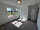 Well-lit bedroom with plush carpeting and ample natural light, showcasing a comfortable space at 2101 Boxwood Circle Se, Conyers, GA 30094
