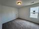 Bright bedroom with neutral tones and plush carpeting, offering a blank canvas for customization at 2101 Boxwood Circle Se, Conyers, GA 30094