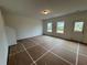 Open-concept living room featuring staircase and access to the outdoors at 2101 Boxwood Circle Se, Conyers, GA 30094