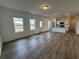 Bright and airy living room with an open layout to the kitchen and dining areas at 2101 Boxwood Circle Se, Conyers, GA 30094
