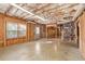 Unfinished basement with exposed wood framing, concrete floors, and utility systems at 4876 Sara Creek Way, Sugar Hill, GA 30518