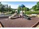 Community playground with a slide and climbing structure, perfect for Gathering fun at 4876 Sara Creek Way, Sugar Hill, GA 30518