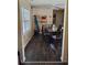 Cozy dining room featuring stylish flooring, a ceiling fan, and a well-lit eating area at 867 Commodore Nw Dr, Atlanta, GA 30318