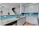 Bright kitchen featuring stainless steel appliances, granite counters, and modern cabinets at 1112 Birch Sw St, Atlanta, GA 30310