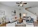 Inviting living room with a stylish bar cart, hardwood floors, and chic accents at 1112 Birch Sw St, Atlanta, GA 30310
