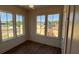 Bedroom with hardwood floors, a ceiling fan, and natural light from windows at 127 Stein Steel Street # 112, Atlanta, GA 30316