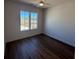 Bright bedroom featuring wood floors, a ceiling fan, and natural light from windows at 127 Stein Steel Street # 112, Atlanta, GA 30316