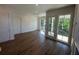 Spacious living room with ample natural light and balcony access at 127 Stein Steel Street # 112, Atlanta, GA 30316