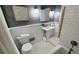 Elegant bathroom showcasing a classic pedestal sink, tile flooring, and modern fixtures for a refreshed look at 2132 Clairmont Rd, Brookhaven, GA 30033