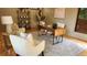 Inviting home office featuring hardwood floors, comfortable seating, and stylish decor at 2132 Clairmont Rd, Brookhaven, GA 30033
