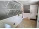 Practical laundry area with ample storage, a utility sink, and access to the exterior at 2132 Clairmont Rd, Brookhaven, GA 30033