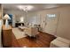 Welcoming living room with hardwood floors, neutral decor, modern lighting, and bright natural light at 2132 Clairmont Rd, Brookhaven, GA 30033