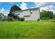 Expansive backyard featuring a lush lawn and a deck, offering space for outdoor activities at 30 W Fork Way, Temple, GA 30179