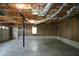 Spacious unfinished basement ready for customization with exposed ceiling and cement floor at 30 W Fork Way, Temple, GA 30179
