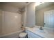 Bathroom featuring a shower-tub combination and a white sink at 30 W Fork Way, Temple, GA 30179