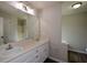 Bathroom vanity with dual sinks and large mirror at 30 W Fork Way, Temple, GA 30179
