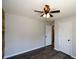 Bedroom with gray walls, ceiling fan, and vinyl flooring at 30 W Fork Way, Temple, GA 30179