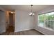 Dining area featuring a large window and entry into the hallway at 30 W Fork Way, Temple, GA 30179