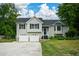 Charming two-story home featuring a two-car garage and well-manicured lawn in a desirable neighborhood at 30 W Fork Way, Temple, GA 30179