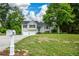 Attractive home with an attached garage, complemented by a green lawn and front yard landscaping at 30 W Fork Way, Temple, GA 30179