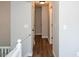 Upstairs hallway with doors to various bedrooms and bathrooms at 30 W Fork Way, Temple, GA 30179