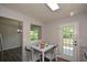 Eat-in kitchen with table and view to backyard at 30 W Fork Way, Temple, GA 30179