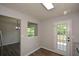 Bright eat-in kitchen area with a door to the outside deck at 30 W Fork Way, Temple, GA 30179