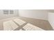 Bright bedroom features neutral carpet, window, and base trim at 4028 Trimrose Ct, Atlanta, GA 30349
