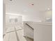 Hallway with natural light, carpet, and stairway access at 4028 Trimrose Ct, Atlanta, GA 30349