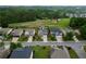 Aerial view of the neighborhood with well-maintained homes and landscaping at 4195 Settlers Grove Rd, Cumming, GA 30028