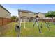 Expansive backyard features a playset and plenty of room to run at 4195 Settlers Grove Rd, Cumming, GA 30028