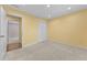 Neutral bedroom features carpet floors, recessed lights, and a large closet at 4195 Settlers Grove Rd, Cumming, GA 30028