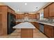 Modern kitchen with a marble island, stainless steel appliances, and ample cabinetry at 4195 Settlers Grove Rd, Cumming, GA 30028