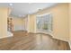 Inviting living area featuring hardwood floors and a bright bay window at 4195 Settlers Grove Rd, Cumming, GA 30028