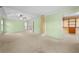 Spacious main bedroom includes tray ceiling, carpeted flooring, and access to walk-in closet at 4195 Settlers Grove Rd, Cumming, GA 30028