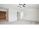 Large main bedroom with multiple doorways and natural light at 5527 Fairhaven Pl, Fairburn, GA 30213
