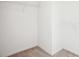 Walk-in closet with carpet and wire shelving ready to organize your wardrobe at 5527 Fairhaven Pl, Fairburn, GA 30213