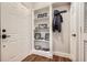 Inviting entryway featuring a stylish built-in bookshelf, fresh paint, and updated flooring at 3777 Peachtree Ne Rd # 412, Brookhaven, GA 30319