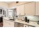 Updated kitchen with white cabinetry, granite countertops, and stainless steel appliances at 3777 Peachtree Ne Rd # 412, Brookhaven, GA 30319