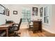 Home office space with wood flooring, modern furniture, and natural light from shuttered windows at 3777 Peachtree Ne Rd # 412, Brookhaven, GA 30319
