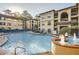 Resort-style pool with fountains and lounge chairs at a luxurious apartment complex with well-maintained landscaping at 3777 Peachtree Ne Rd # 412, Brookhaven, GA 30319