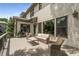 Expansive deck with wicker furniture offers great views of the lush, green backyard at 4823 Layfield Dr, Atlanta, GA 30338