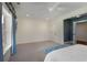 Bright bedroom with a large window and neutral carpet at 4823 Layfield Dr, Atlanta, GA 30338