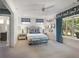 Charming bedroom with patterned textiles and ample natural light at 4823 Layfield Dr, Atlanta, GA 30338