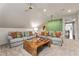 Cozy living room with comfortable seating, unique coffee table, and stylish decor, perfect for relaxation and entertaining at 4823 Layfield Dr, Dunwoody, GA 30338